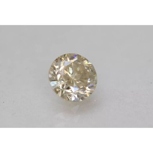 0.67 Carat Brown Yellow Round Brilliant Enhanced Natural Diamond 5.35mm - Picture 3 of 3